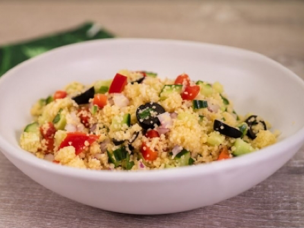 Greek cucumber salad with tomato and couscous